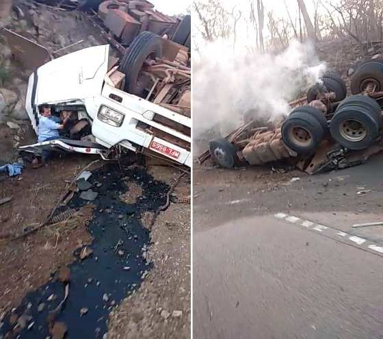O motorista ficou preso entre as ferragens da carreta.