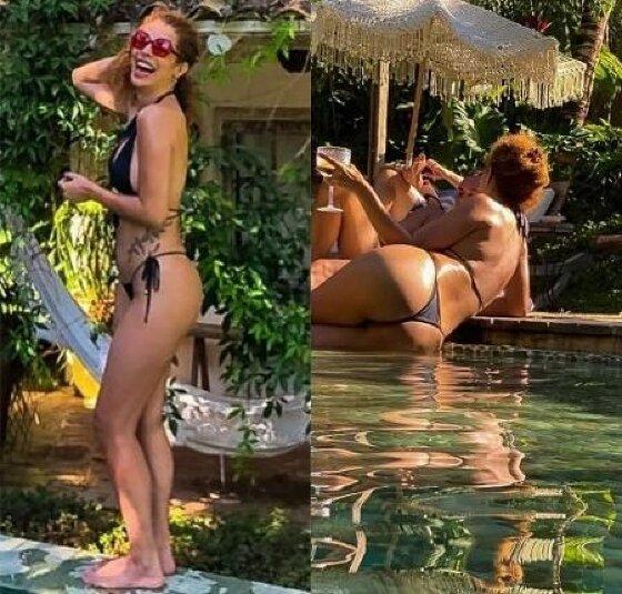 Cantora utilizou um biquíni preto da moda para se refrescar em piscina