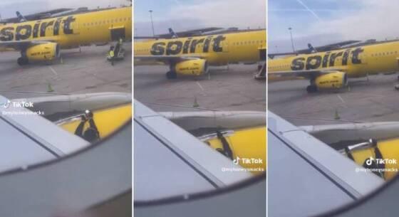 Funcionário coloca várias camadas da Speed Tape na asa.