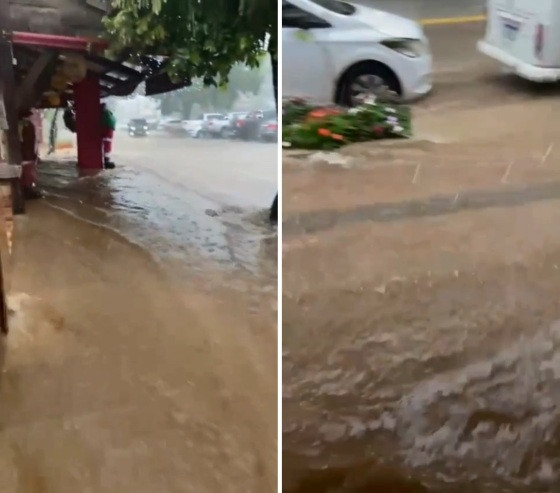 Chuva alagou rua e invadiu comércio da cidade