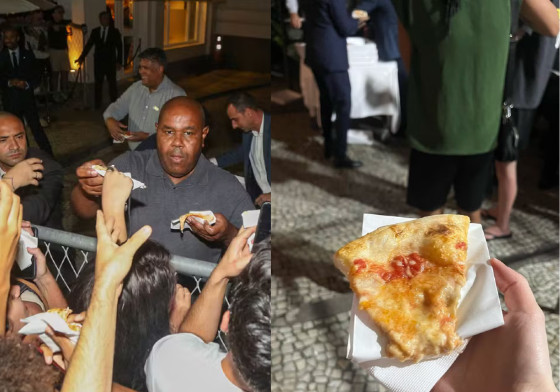 Cantora pop presenteou os fãs que se aglomeram no local com pizza.