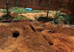 Polícia encontra corpo enterrado em cova rasa 