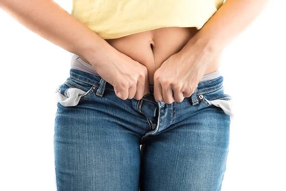 depositphotos_77346370-stock-photo-woman-trying-to-close-jeans.jpg