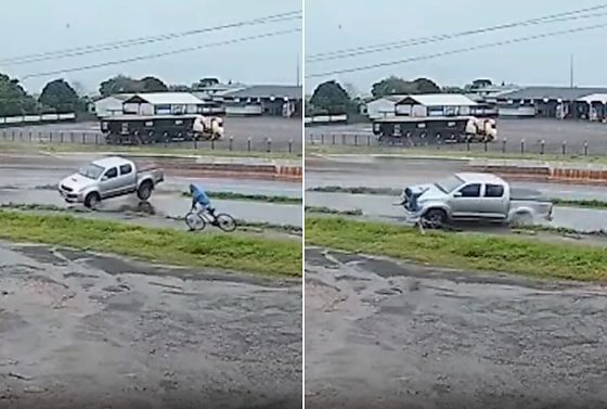 Ciclista conseguiu pular a tempo e escapar sem ferimentos antes de a caminhonete capotar e atingir a bicicleta.
