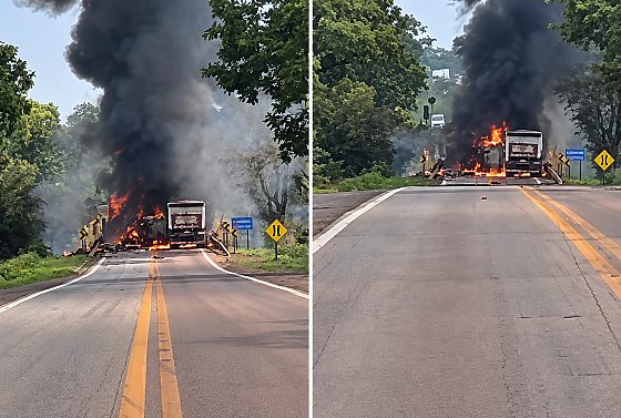 Caminhões pegaram fogo após a batida registrada na tarde de hoje (14).
